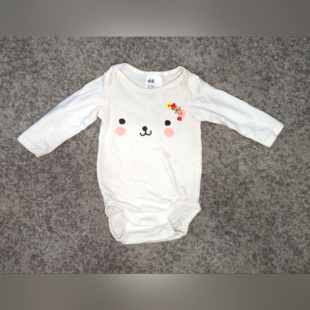 H&M white onesie. 2-4 months size.